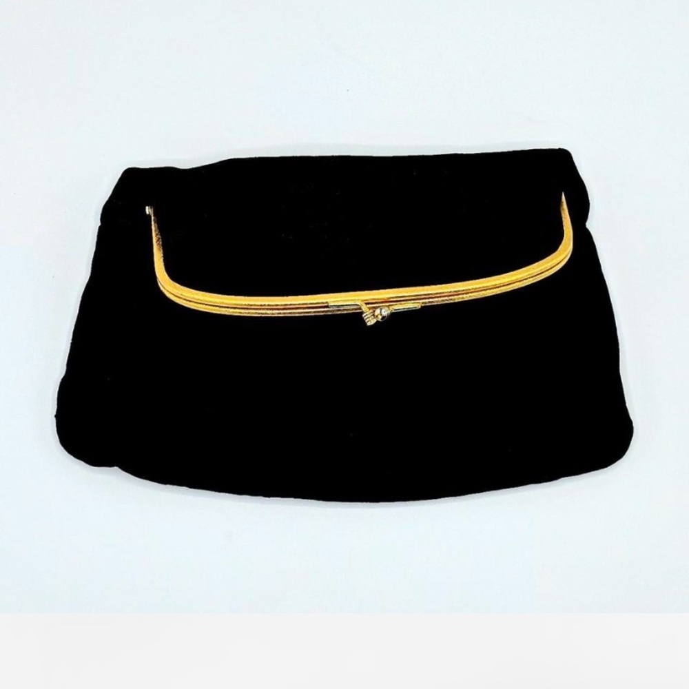 1950’s Coblentz Original black vintage clutch with gold details.